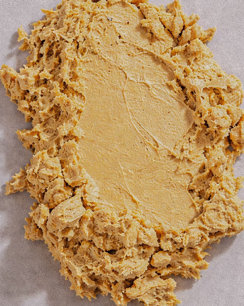 Close-up of Mānuka Gold Extract powder — golden yellow pigment used in MN8 full-spectrum extraction